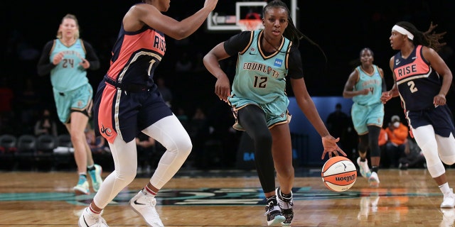 WNBA star Michaela Onyen was giving back to the New York community with a new season on the horizon 6 Michaela Onyenwere New York Liberty drives against the Washington Mystics on September 17, 2021, at Barclays Center in Brooklyn.