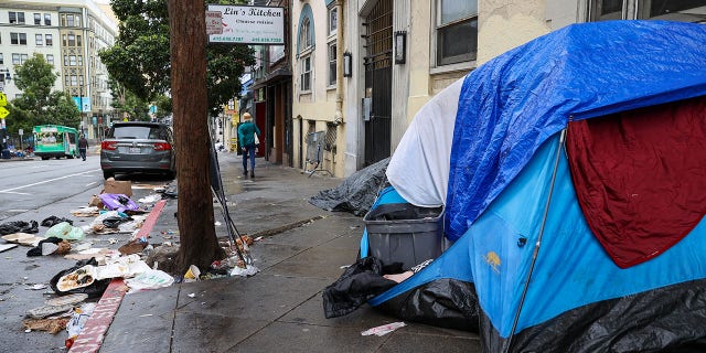 Homeless people on streets of the Tenderloin district in San Francisco Oct. 30, 2021. 