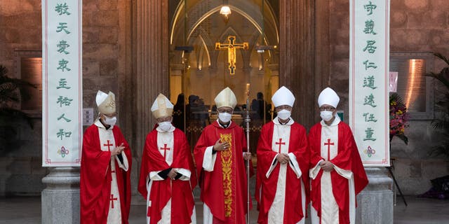 (L to R) Cardinals John Tong Hon, Cardinal Joseph Zen, Bishop Stephen Chow, Bishop Joseph Ha and Dom. Paul Gao pose for a photo at the Episcopal Ordination of the Most Reverend Stephen Chow in Hong Kong's Cathedral of the Immaculate Conception on Dec. 4, 2021.