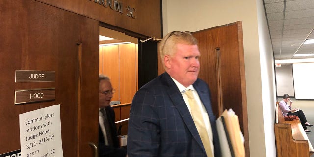 Alex Murdaugh, fourth generation of a powerful South Carolina dynasty and owner of a boat involved in a fatal accident, leaves a hearing in a personal injury lawsuit at the Richland County Courthouse.