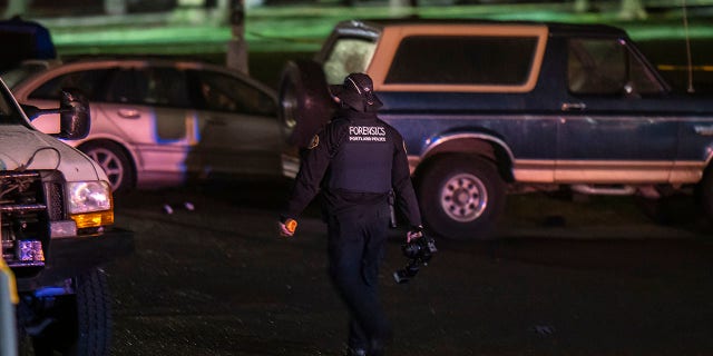 Portland police investigate a shooting that took place during a protest for Amir Locke, which officials said left one dead and five others injured, on February 19, 2022 in Portland, Oregon. Locke was shot and killed by police in Minneapolis, Minnesota during a no-knock raid.