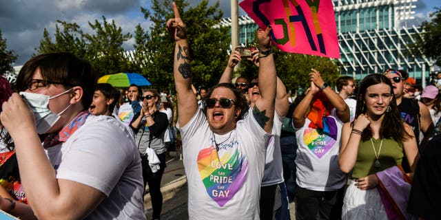 Members and supporters of the LGBTQ community attend the "Say Gay Anyway" rally in Miami Beach, Florida on March 13, 2022. 