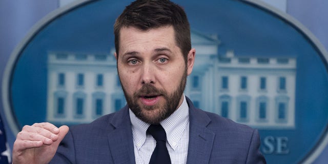 Brian Deese, director of the National Economic Council, speaks during a news conference at the White House.