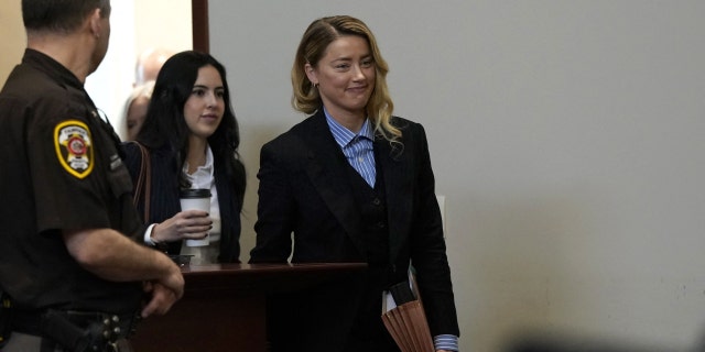 Amber Heard enters the courtroom at the Fairfax County Circuit Court in Fairfax, Virginia, on May 3, 2022.