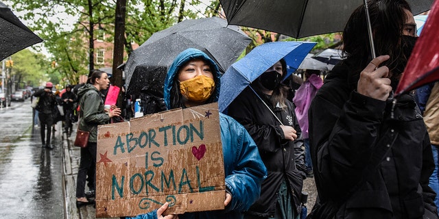Abortion-rights activists gather outside of a Catholic church in downtown Manhattan to voice their support for a woman's right to choose on May 07, 2022 in New York City.