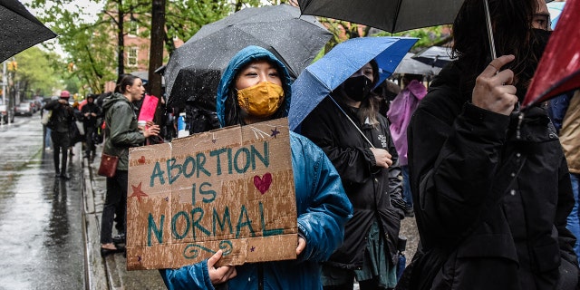 Abortion-rights activists gather outside of a Catholic church in downtown Manhattan to voice their support for a woman's right to choose on May 07, 2022 in New York City.