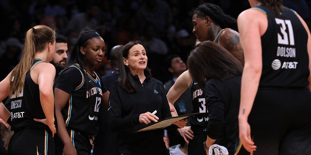 Head Coach Sandy Brondello of the New York Liberty speaks with her team during the Connecticut Sun game on May 7, 2022, at the Barclays Center in Brooklyn.