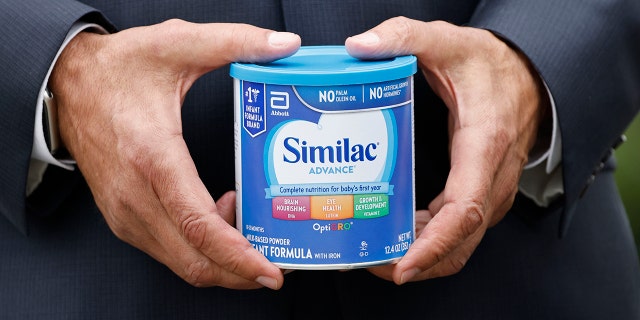 A House member holds a can of Similac infant formula during a news conference about the shortage of baby formula outside the US Capitol in Washington, D.C., US, on Thursday, May 12, 2022.