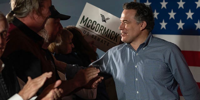 Dave McCormick shakes hands with supporters at the rally to support his bid to the Senate.