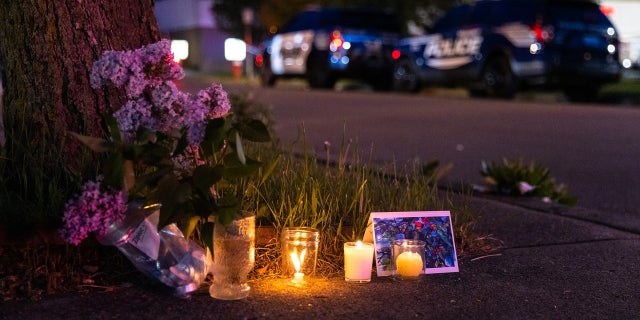 May 14, 2022: A small vigil set up across the street from a Tops grocery store on Jefferson Avenue in Buffalo, where a heavily armed 18-year-old White man entered the store in a predominantly Black neighborhood and shot 13 people, killing ten.