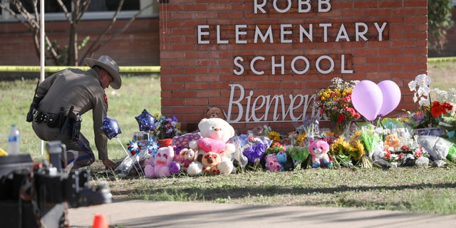 A view from the makeshift memorial in front of Robb Elementary School in Uvalde, Texas, on May 25, 2022. (Photo by Yasin Ozturk/Anadolu Agency via Getty Images)