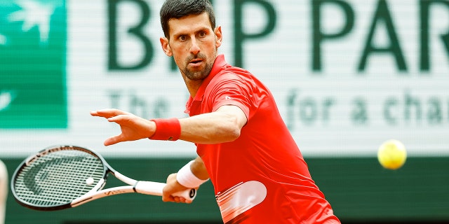 Novak Djokovic of Serbia plays against Aljaz Bedene of Slovenia during the 2022 French Open at Roland Garros on May 27, 2022 in Paris. 