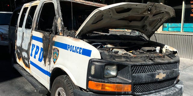 This image shows one of many NYPD vehicles burned in New York City during demonstrations that broke out on May 31, 2020, after George Floyd's death.