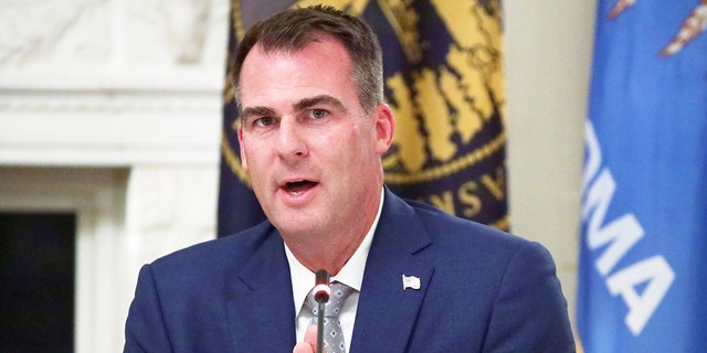 FILE - Governor Kevin Stitt, R-Okla., speaks during a roundtable at the White House in Washington, D.C., June 18, 2020.