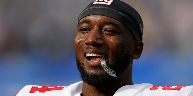 James Bradberry #24 of the New York Giants smiles during warm up before the game against the Los Angeles Chargers at SoFi Stadium on December 12, 2021 in Inglewood, California.