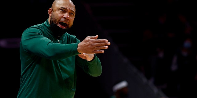 Acting head coach Darvin Ham of the Milwaukee Bucks reacts during the second half of a game against the Charlotte Hornets at Spectrum Center Jan. 8, 2022, in Charlotte, N.C.