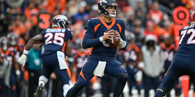 Drew Lock #3 of the Denver Broncos passes against the Kansas City Chiefs in the first half at Empower Field at Mile High on January 8, 2022, in Denver, Colorado.