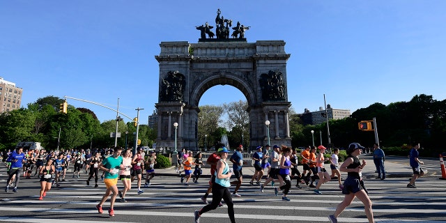 The 2019 Brooklyn Half Marathon passes by Grand Army Plaza.