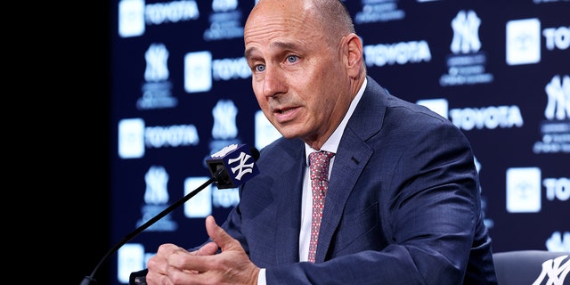 Yankees general manager Brian Cashman speaks to the media ahead of the Boston Red Sox game on April 8, 2022 in New York City.