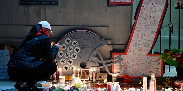 A vigil is held at Ohio Stadium in memory of former Buckeye Dwayne Haskins Jr. on April 12, 2022, in Columbus, Ohio. 