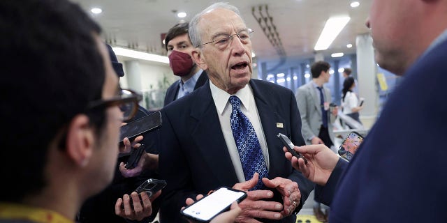 Sen. Charles Grassley speaks to the media as he arrives at the U.S. Capitol on April 25, 2022. 