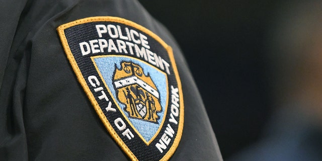 FILE- NEW YORK, NEW YORK - MARCH 11:  NYPD logo on the sleeve of a New York City policeman.