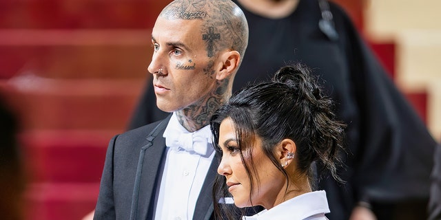 NEW YORK, NEW YORK - MAY 02: Travis Barker and Kourtney Kardashian arrive to The 2022 Met Gala on May 02, 2022 in New York City.