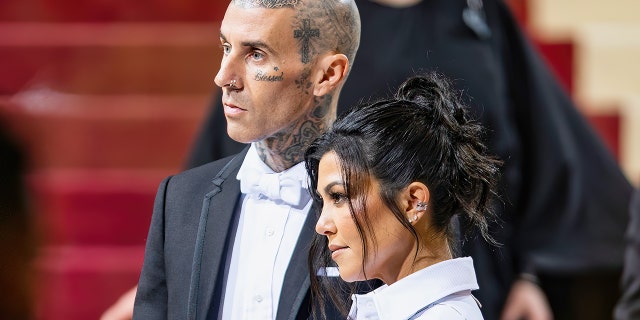 NEW YORK, NEW YORK - MAY 02: Travis Barker and Kourtney Kardashian arrive to The 2022 Met Gala on May 02, 2022 in New York City.