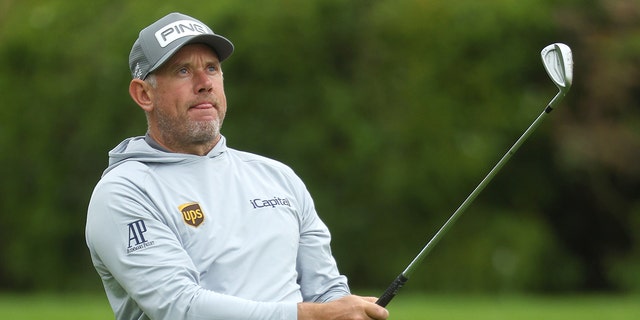 Lee Westwood of England plays his second shot on the 13th hole during the second round of the Betfred British Masters hosted by Danny Willett at The Belfry on May 06, 2022 in Sutton Coldfield, England. 
