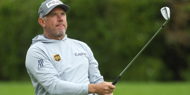 Lee Westwood of England plays his second shot on the 13th hole during the second round of the Betfred British Masters hosted by Danny Willett at The Belfry on May 06, 2022 in Sutton Coldfield, England. 