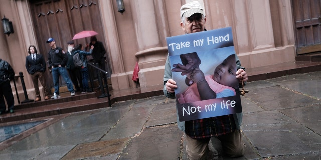 Pro-life activists confront a gathering of pro-abortion demonstrators outside of a Catholic church in downtown Manhattan on May 07, 2022 in New York City.