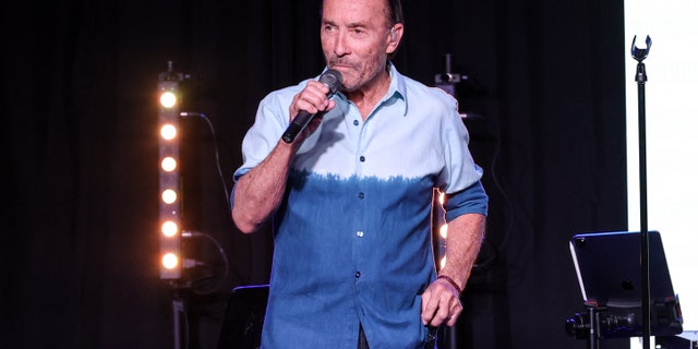 Lee Greenwood is shown performing on stage during a Music Memorial for Jeff Carson at Nashville Palace on May 10, 2022, in Nashville, Tenn. 