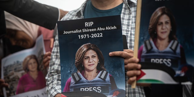 Tributes are paid to murdered Palestinian journalist Shireen Abu Akleh during a protest and vigil at BBC Broadcasting House on May 12, 2022 in London, England. 