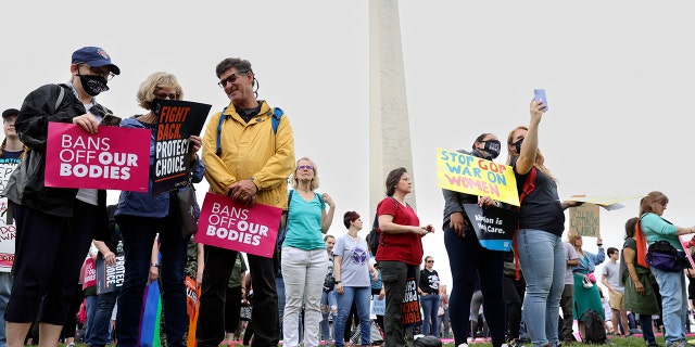 Abortion rights activists participate in a Bans Off Our Bodies rally on May 14, 2022 in Washington, DC.