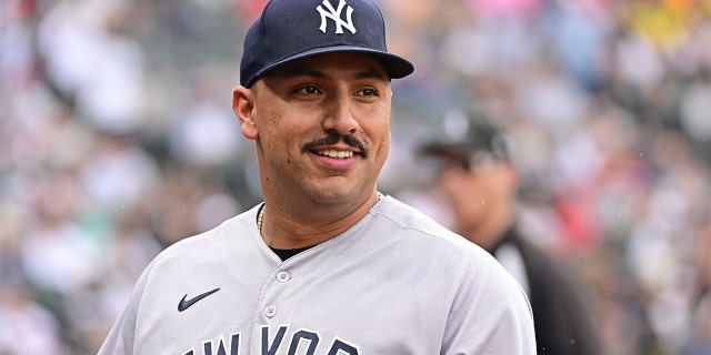 Starting pitcher Nestor Cortes #65 of the New York Yankees reacts after finishing the eighth inning against the Chicago White Sox at Guaranteed Rate Field on May 15, 2022, in Chicago, Illinois.