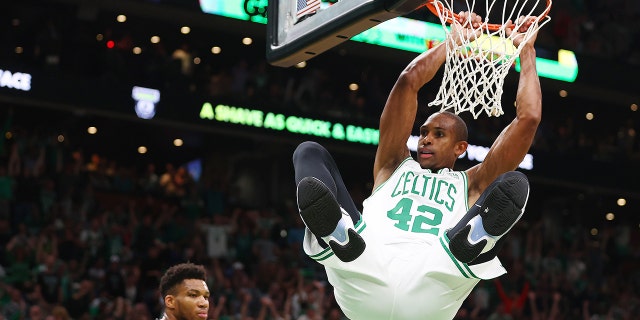 Al Horford of the Celtics dunks the ball against the Milwaukee Bucks at TD Garden on May 15, 2022, in Boston.