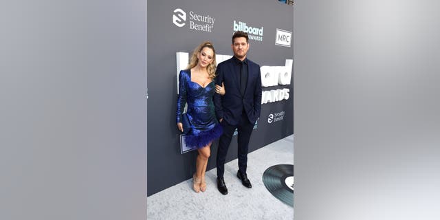 Luisana Lopilato and Michael Bublé arrive to the 2022 Billboard Music Awards held at the MGM Grand Garden Arena on May 15, 2022. -- (Photo by Todd Williamson/NBC/NBCU Photo Bank via Getty Images)