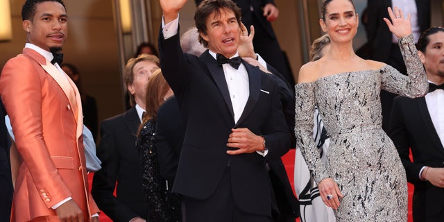 Greg Tarzan Davis, Tom Cruise and Jennifer Connelly attend the screening of "Top Gun: Maverick" during the 75th annual Cannes film festival. Paramount is being sued for copyright over "Top Gun: Maverick."  