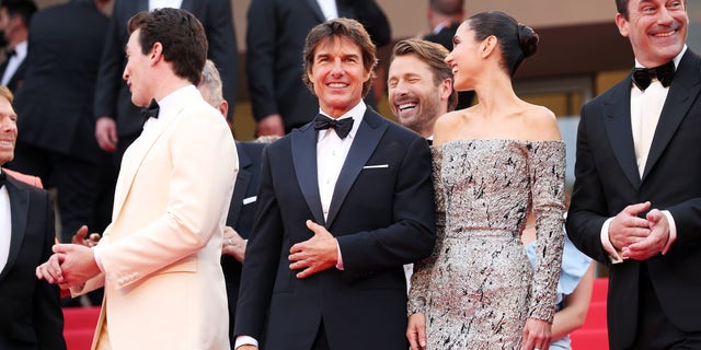 Miles Teller, Tom Cruise, Glen Powell, Jennifer Connelly and Jon Hamm attend the screening of "Top Gun: Maverick" during the 75th annual Cannes Film Festival.