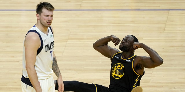 Draymond Green of the Golden State Warriors reacts against Luka Doncic of the Dallas Mavericks during Game 1 of the Western Conference Finals at Chase Center on May 18, 2022, in San Francisco, California.