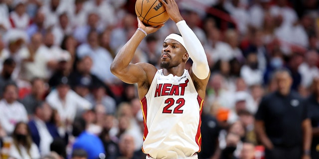 The Heat's Jimmy Butler shoots against the Boston Celtics in Game Two of the Eastern Conference Finals at FTX Arena on May 19, 2022, a Miami, Florida.
