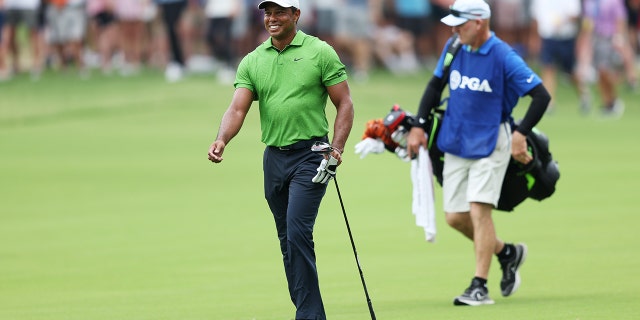 Tiger Woods walks along the 13th hole during the second round of the 2022 PGA Championship at Southern Hills Country Club May 20, 2022.