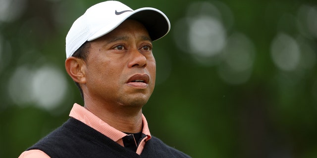 Tiger Woods walks to the fourth tee during the third round of the 2022 PGA Championship at Southern Hills Country Club in Tulsa, Oklahoma, on May 21, 2022.