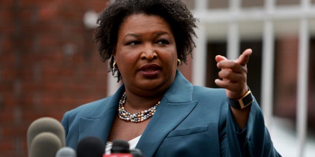 Democratic gubernatorial candidate Stacey Abrams speaks to the media during a press conference at the Israel Baptist Church as voters head to the polls during the Georgia primary on May 24, 2022 in Atlanta, Georgia.