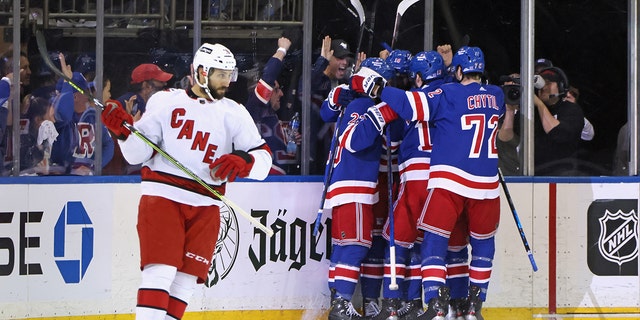 The New York Rangers celebrate a first period goal by Frank Vatrano #77 against the Carolina Hurricanes in Game Four of the Second Round of the 2022 Stanley Cup Playoffs at Madison Square Garden on May 24, 2022 in New York 