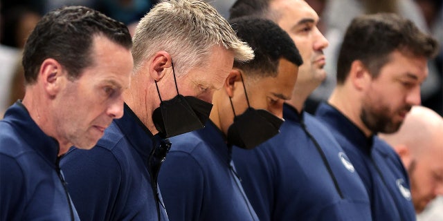 Head coach Steve Kerr of the Golden State Warriors joins a moment of silence for the victims of the mass shooting at Robb Elementary School in Uvalde, Texas, before the playoff game against the Mavericks on May 24, 2022, in Dallas.