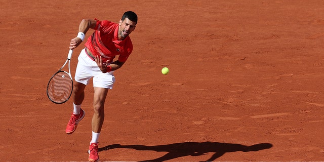 Novak Djokovic of Serbia in action against Aljaz Bedene of Slovenia in a third round match at Roland Garros May 27, 2022 