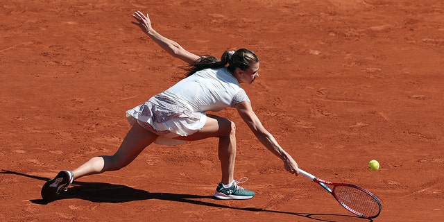 Camilla Giorgi of Italy is seen in action against Daria Kasatkina of Russia on the ninth day of the French Open at Roland Garros on May 30, 2022 in Paris, France. 