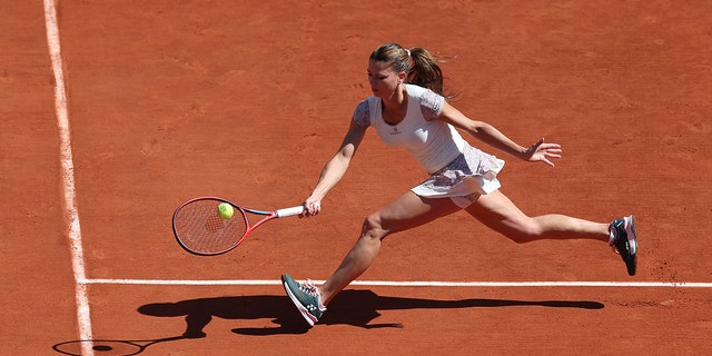 Camilla Giorgi of Italy is seen in action against Daria Kasatkina of Russia on the ninth day of the French Open at Roland Garros in Paris on May 30, 2022.
