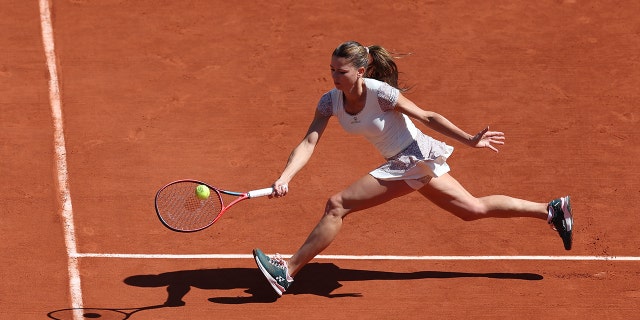 Camila Giorgi of Italy is seen in action against Daria Kasatkina of Russia during day nine of the French Open at Roland Garros on May 30, 2022 in Paris.